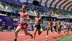 EUGENE, OREGON - JULY 17: Carlos Mayo of Team Spain and  Grant Fisher of Team United States competes in the in the Men's 10,000m Final on day three of the World Athletics Championships Oregon22 at Hayward Field on July 17, 2022 in Eugene, Oregon. (Photo by Andy Lyons/Getty Images for World Athletics)