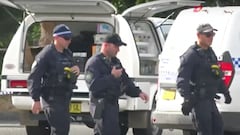 Policía paseando por el parking de la playa de Coffs Harbour, NSW, Australia.