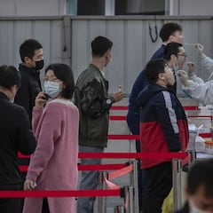 Areas of China return to strict lockdown rules as new case numbers return to 2020 peak