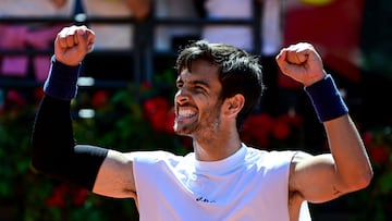 Italy's Lorenzo Musetti celebrates after winning the men's single match against US' Brandon Nakashima during the ATP Rome Open tennis tournament at Foro Italico in Rome on May 11, 2025. (Photo by PIERO CRUCIATTI / AFP)