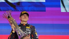 Red Bull Racing's Dutch driver Max Verstappen celebrates winning the Saudi Arabian Formula One Grand Prix during the podium ceremony at the Jeddah Corniche Circuit in Jeddah on March 9, 2024. (Photo by Giuseppe CACACE / AFP)