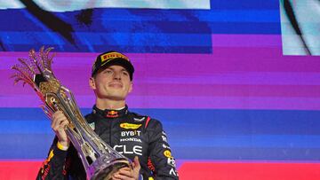 Red Bull Racing's Dutch driver Max Verstappen celebrates winning the Saudi Arabian Formula One Grand Prix during the podium ceremony at the Jeddah Corniche Circuit in Jeddah on March 9, 2024. (Photo by Giuseppe CACACE / AFP)