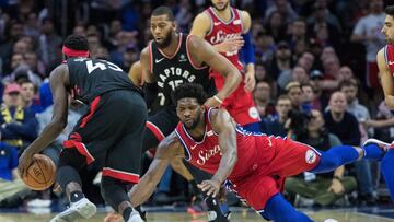 Feb 5, 2019; Philadelphia, PA, USA; Toronto Raptors forward Pascal Siakam (43) picks up a loose ball past Philadelphia 76ers center Joel Embiid (21) during the third quarter at Wells Fargo Center. Mandatory Credit: Bill Streicher-USA TODAY Sports