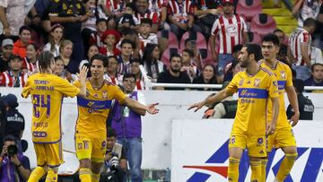 Tigres' forward Diego Lainez (2-L) celebrates with teammates after scoring a goal against Guadalajara during the Mexican Apertura football tournament match between Guadalajara and Tigres at the Jalisco stadium in Guadalajara, Jalisco State, Mexico, on October 28, 2023. (Photo by Ulises RUIZ / AFP)