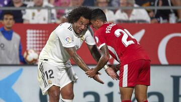 Marcelo y Pedro Porro, en el partido de Liga de esta temporada.