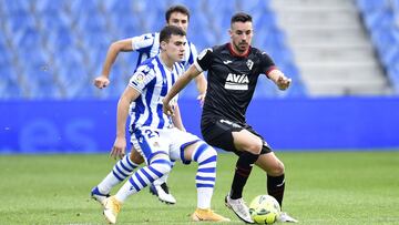 SAN SEBASTIAN, SPAIN - DECEMBER 13: Ander Barrenetxea of Real Sociedad battles for possession with Edu Exposito of Eibar during the La Liga Santander match between Real Sociedad and SD Eibar at Estadio Anoeta on December 13, 2020 in San Sebastian, Spain.
