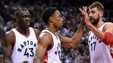 Oct 26, 2016; Toronto, Ontario, CAN;  Toronto Raptors guard DeMar DeRozan (10) is greeted by center Jonas Valanciunas (17) and forward Pascal Siakam (43) after making a basket against Detroit Pistons in the second half at Air Canada Centre. Mandatory Credit: Dan Hamilton-USA TODAY Sports