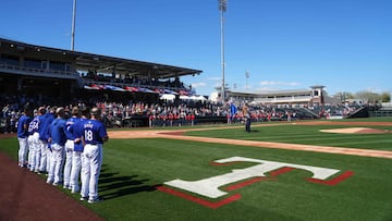 Mar 4, 2024; Surprise, Arizona, USA; Texas Rangers and Los Angeles Angels look on during the national anthem prior to the game at Surprise Stadium. Mandatory Credit: Joe Camporeale-USA TODAY Sports