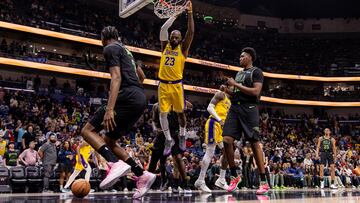 Jan 6, 2026; New Orleans, Louisiana, USA; Los Angeles Lakers forward LeBron James (23) dunks the ball against New Orleans Pelicans center Derik Queen (22) during the first half at Smoothie King Center. Mandatory Credit: Stephen Lew-Imagn Images