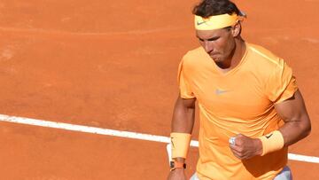 Spain&#039;s Rafa Nadal reacts as he plays against Novak Djokovic of Serbia during their semi final match at the ATP Tennis Open tournament on May 19, 2018 at the Foro Italico in Rome. / AFP PHOTO / TIZIANA FABI