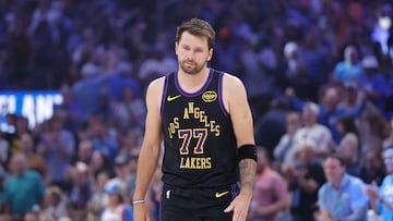 Apr 2, 2026; Oklahoma City, Oklahoma, USA; Los Angeles Lakers guard Luka Doncic (77) walks across the court after a play against the Oklahoma City Thunder during the first quarter at Paycom Center. Mandatory Credit: Alonzo Adams-Imagn Images