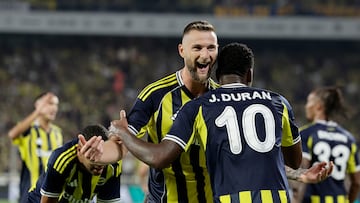 ISTANBUL, TURKEY - AUGUST 12: Jhon Duran of Fenerbahce celebrates 2-1 with Milan Skriniar of Fenerbahce during the UEFA Champions League match between Fenerbahce v Feyenoord at the Sukru Saracoglu Stadium on August 12, 2025 in Istanbul Turkey (Photo by Rico Brouwer/Soccrates/Getty Images)