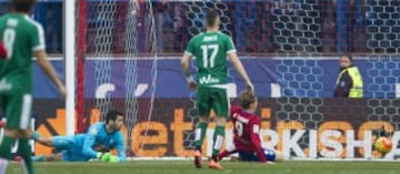 Scoring his 100th goal for Atletico Madrid.