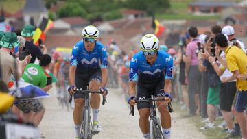 Movistar Team's Basque rider Alex Aranburu (R) and Movistar Team's Basque rider Oier Lazkano (L) cycle in a breakaway over the Baroville "Chemin Blanc" (white road) gravel sector during the 9th stage of the 111th edition of the Tour de France cycling race, 199km stage departing and finishing in Troyes, on July 7, 2024. (Photo by Thomas SAMSON / AFP)