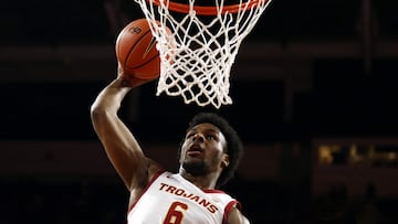 Bronny James #6 of the USC Trojans dunks the ball during warm ups.