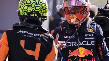 Winner McLaren's British driver Lando Norris (L) is congratulated by Red Bull Racing's Dutch driver Max Verstappen at the end of the Formula One Dutch Grand Prix at The Circuit Zandvoort, western Netherlands, on August 25, 2024. (Photo by JOHN THYS / AFP)