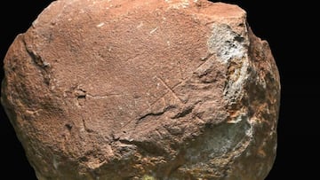Experts speculate rock found in Spain has one of the oldest markings in the history of humanity: 200,000 years old