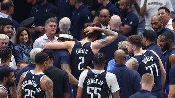 May 26, 2024; Dallas, Texas, USA; Dallas Mavericks center Dereck Lively II (2) leaves the court after an injury in the second quarter against the Minnesota Timberwolves during game three of the western conference finals for the 2024 NBA playoffs at American Airlines Center. Mandatory Credit: Kevin Jairaj-USA TODAY Sports