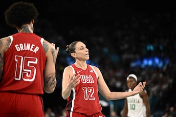 USA's #12 Diana Taurasi reacts in the women's quarterfinal basketball match between Nigeria and USA during the Paris 2024 Olympic Games at the Bercy Arena in Paris on August 7, 2024. (Photo by Aris MESSINIS / AFP)