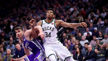 Feb 27, 2019; Sacramento, CA, USA; Milwaukee Bucks forward Giannis Antetokounmpo (34) battles for position with Sacramento Kings guard Bogdan Bogdanovic (8) in the fourth quarter at the Golden 1 Center. Mandatory Credit: Cary Edmondson-USA TODAY Sports