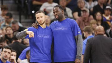 Mar 11, 2017; San Antonio, TX, USA; Golden State Warriors power forward Draymond Green (right) talks with Stephen Curry (30) during the first half against the San Antonio Spurs at AT&T Center. Mandatory Credit: Soobum Im-USA TODAY Sports