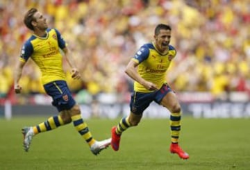 Football - Arsenal v Aston Villa - FA Cup Final - Wembley Stadium - 30/5/15
Alexis Sanchez (R) celebrates with Nacho Monreal after scoring the second goal for Arsenal
Action Images via Reuters / John Sibley
Livepic
EDITORIAL USE ONLY. No use with unauthorized audio, video, data, fixture lists, club/league logos or "live" services. Online in-match use limited to 45 images, no video emulation. No use in betting, games or single club/league/player publications.  Please contact your account representative for further details.