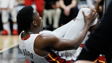 Apr 22, 2023; Miami, Florida, USA; Miami Heat guard Victor Oladipo (4) reacts after getting injured in the fourth quarter against the Milwaukee Bucks during game three of the 2023 NBA Playoffs at Kaseya Center. Mandatory Credit: Sam Navarro-USA TODAY Sports