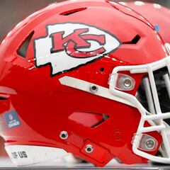 Why do the Kansas City Chiefs wear the color red? What is the origin of their logo?