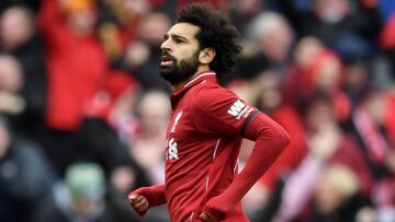 Salah says four wins will give Liverpool title