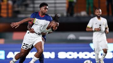 Ghana's forward #25 Antoine Semenyo (C-FRONT) fights for the ball with Cape Verde's defender #5 Logan Costa (C-BACK) during the Africa Cup of Nations (CAN) 2024 group B football match between Ghana and Cape Verde at the Felix Houphouet-Boigny Stadium in Abidjan on January 14, 2024. (Photo by FRANCK FIFE / AFP)