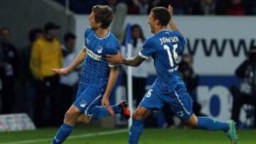 Hoffenheim's striker Sven Schipplock (L) and Hoffenheim's US defender Fabian Johnson (R) celebrate after scoring during the German first division Bundesliga football match 1899 Hoffenheim vs FC Schalke 04 on November 3, 2012 in Sinsheim, southern Germany. Hoffenheim won 3:2. AFP PHOTO / DANIEL ROLAND
DFL RULES TO LIMIT THE ONLINE USAGE DURING MATCH TIME TO 15 PICTURES PER MATCH. IMAGE SEQUENCES TO SIMULATE VIDEO IS NOT ALLOWED AT ANY TIME. FOR FURTHER QUERIES PLEASE CONTACT DFL DIRECTLY AT + 49 69 650050.