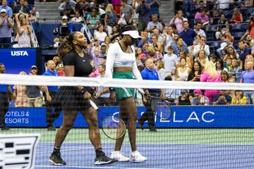 USA's Serena Williams (L) and Venus Williams 