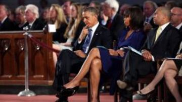 El presidente estadounidense Barack Obama y su mujer, Michelle Obama, asisten a la ceremonia celebrada por las víctimas de los atentados del pasado lunes en Boston.