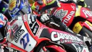 <b>"HE SALIDO UN MOMENTO"</b> Así definió el piloto español su ausencia en el Gran Premio de Japón, colgando un cartel en su box en el que se podía leer: "He salido un momento, vuelvo en Qatar".