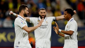 Nacho celebra su gol con Benzema y Rodrygo.