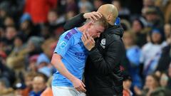 Kevin De Bruyne junto a Guardiola. 