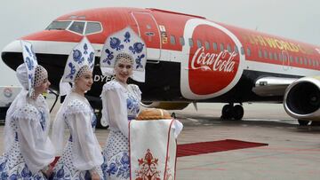 Women wearing traditional costumes attends a welcoming ceremony for the FIFA World Cup Trophy at Vladivostok International Airport outside the far eastern city of Vladivostok, Russia May 1, 2018. REUTERS/Yuri Maltsev