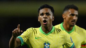Brazil's forward Rodrygo celebrates after scoring during the 2026 FIFA World Cup South American qualifiers football match between Brazil and Ecuador, at the Major Ant�nio Couto Pereira stadium in Curitiba, Brazil, on September 6, 2024. (Photo by Mauro PIMENTEL / AFP)