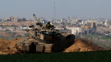 An Israeli tank manoeuvres along the border with northern Gaza, amid the ongoing conflict between Israel and the Palestinian Islamist group Hamas, in Israel, January 30, 2024. REUTERS/Amir Cohen     TPX IMAGES OF THE DAY