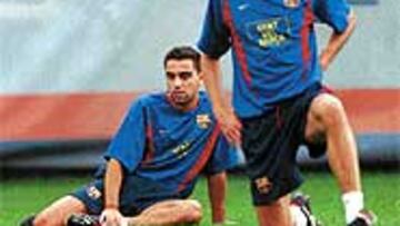 <B>SIN CONFIANZA</B>. Xavi parece que no contará mucho para Frank Rijkaard tras la recuperación de Motta.