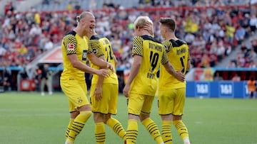 LEVERKUSEN, GERMANY - SEPTEMBER 11: (L-R) Erling Haaland, Thomas Meunier, Julian Brandt and Marco Reus celebrate their teams second goal during the Bundesliga match between Bayer 04 Leverkusen and Borussia Dortmund at BayArena on September 11, 2021 in Lev