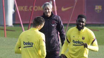 Lenglet, en un entrenamiento con Umtiti.