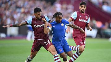 Chelsea's English midfielder #07 Raheem Sterling (C) challenges West Ham United's Italian defender #33 Emerson Palmieri and West Ham United's English midfielder #07 James Ward-Prowse during the English Premier League football match between West Ham United and Chelsea at the London Stadium, in London on August 20, 2023. (Photo by JUSTIN TALLIS / AFP) / RESTRICTED TO EDITORIAL USE. No use with unauthorized audio, video, data, fixture lists, club/league logos or 'live' services. Online in-match use limited to 120 images. An additional 40 images may be used in extra time. No video emulation. Social media in-match use limited to 120 images. An additional 40 images may be used in extra time. No use in betting publications, games or single club/league/player publications. /