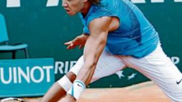 <b>EL REGRESO DE TARZÁN. </b>La imagen de ayer, de siempre: Nadal en la tierra, como Tarzán en la jungla.