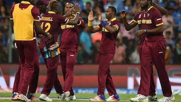 West Indies players celebrate after the wicket of India&#039;s Ajinkya Rahane during the World T20 cricket tournament semi-final match against India.