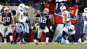Jan 13, 2018; Foxborough, MA, USA; New England Patriots quarterback Tom Brady (12) celebrates throwing a touchdown pass against the Tennessee Titans during the third quarter of the AFC Divisional playoff game at Gillette Stadium. Mandatory Credit: Greg M. Cooper-USA TODAY Sports
