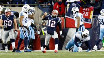 Jan 13, 2018; Foxborough, MA, USA; New England Patriots quarterback Tom Brady (12) celebrates throwing a touchdown pass against the Tennessee Titans during the third quarter of the AFC Divisional playoff game at Gillette Stadium. Mandatory Credit: Greg M. Cooper-USA TODAY Sports