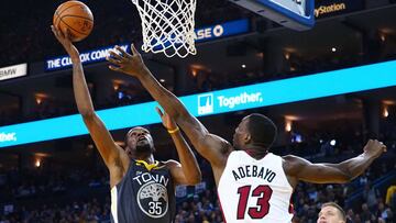 Feb 10, 2019; Oakland, CA, USA; Golden State Warriors forward Kevin Durant (35) shoots the ball against Miami Heat center Bam Adebayo (13) during the third quarter at Oracle Arena. Mandatory Credit: Kelley L Cox-USA TODAY Sports