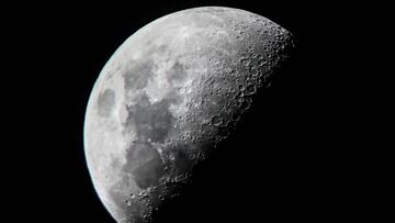 (FILES) This file photo taken on June 10, 2019 shows the moon in the sky above Mandalay city in central Myanmar. - Russia and China on March 9, 2021 signed a memorandum of understanding for the joint construction of a lunar space station, Russia's space agency Roscosmos said in a statement. (Photo by Ye Aung THU / AFP)