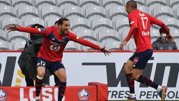 Lille&#039;s Turkisch midfielder Yusuf Yazici and Lille&#039;s forward Burak Yilmaz jubilate after scoring a goal during the French L1 football match between Lille OSC and AS Monaco at the Pierre-Mauroy stadium in Villeneuve-d&#039;Ascq, northern France, 